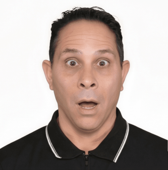 John with his eyes wide and his mouth open in surprise