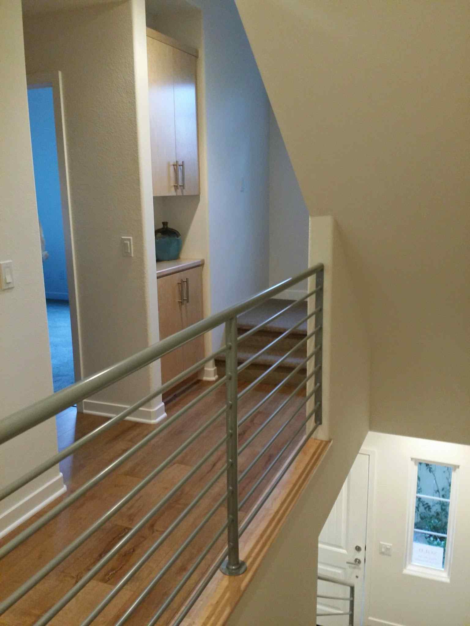 Flooring and stair railing, photo 1